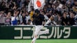 March 12: Japan's infielder Sho Nakata runs to home