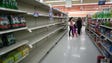 Bare shelves are seen at a  grocery store in Homestead,