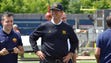 Michigan coach Jim Harbaugh watches as the U-M football