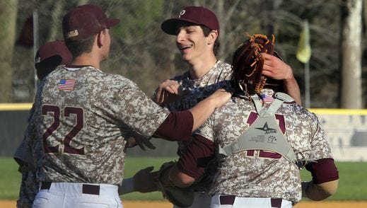 Iona Prep's Joe LaSorsa (center) was The Journal News Westchester/Putnam player of the year, but the decision was far from easy.