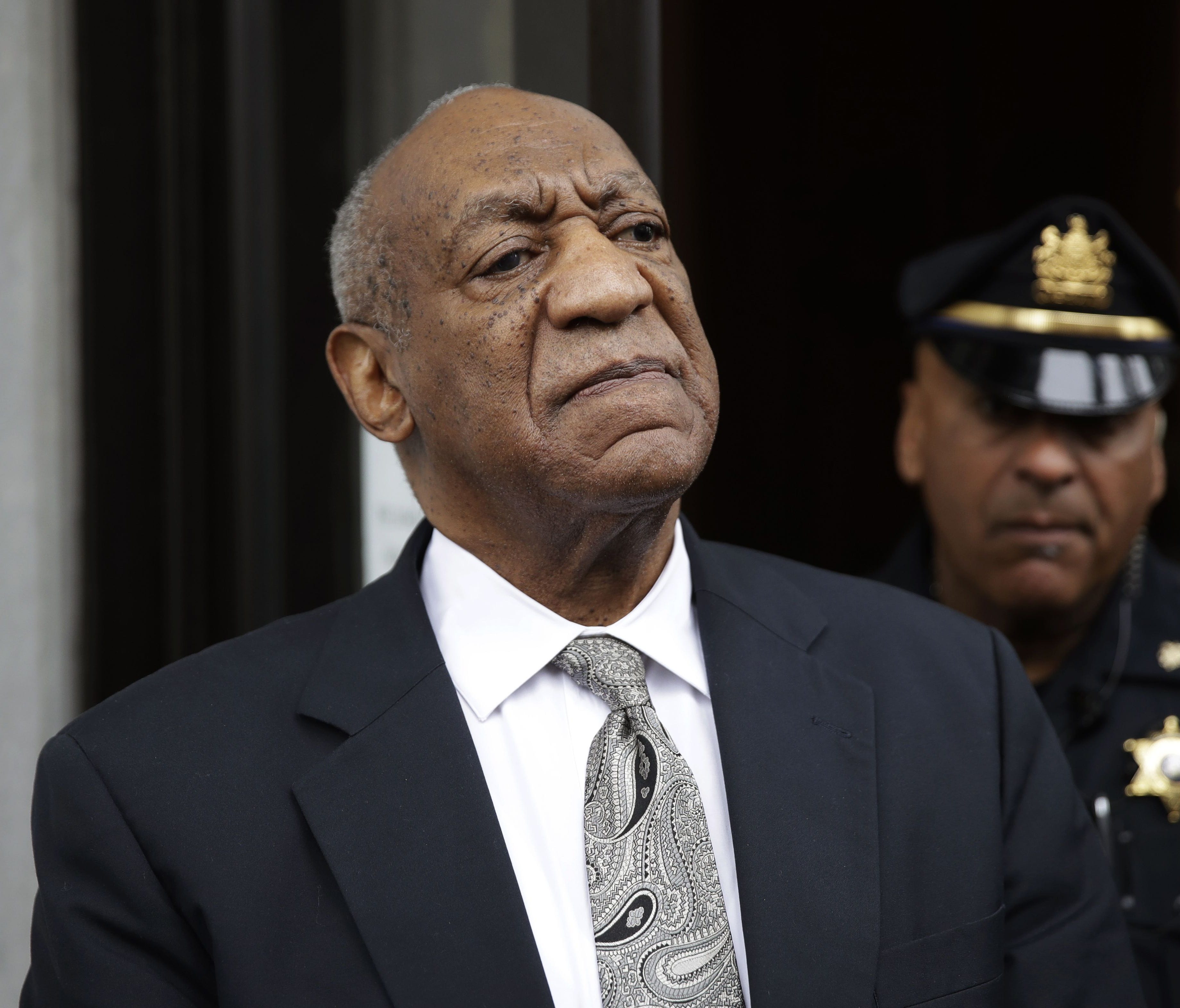 Bill Cosby exits the Montgomery County Courthouse on June 17, 2017, after a mistrial was declared in his sexual assault trial in Norristown, Pa.