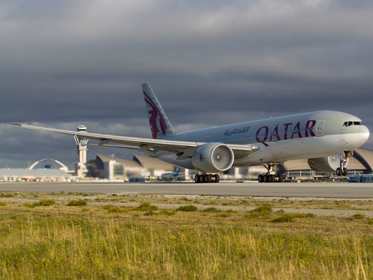 A Qatar Airways Boeing 777 takes off from Los Angeles