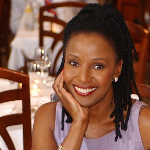 Barbara Smith shows off some of the dishes at her...