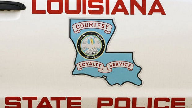 A pickup truck hit a school bus head-on early Thursday in Beauregard Parish, killing one person and injuring three others, according to Louisiana State Police.