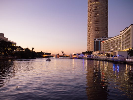 This sunset overlooks the Sheraton Riverwalk and downtown Squarerise