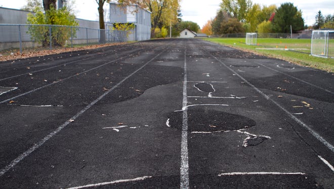 The Marshfield Middle School track, as seen in this 2013 file photo, has deteriorated to the point where the district no longer can host track meets.