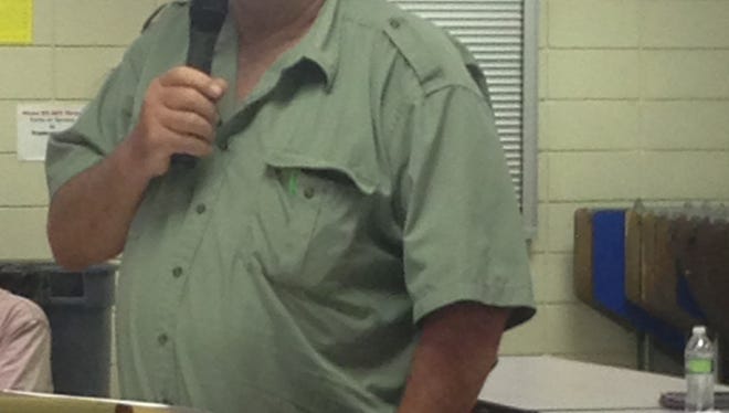 Farmer Randy Stutes voices his fears at the DEQ public hearing that a permit allowing Multi-Chem to discharge waste water into Vermilion Parish waterways would contaminate his crops.