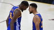 Kevin Durant celebrates with Stephen Curry during the