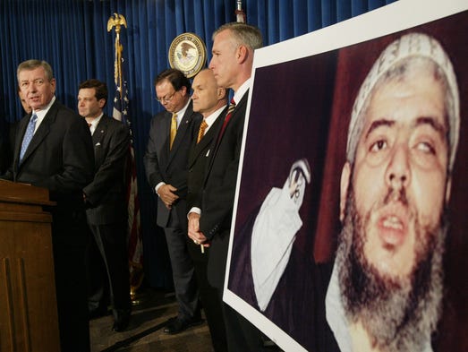 Assistant Attorney General Christopher A. Wray,  (left)