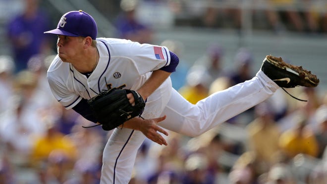 LSU pitcher Austin Bain pitches in the third inning of a game against Lehigh at the Baton Rouge Regional of the NCAA college baseball tournament in Baton Rouge, La., Friday, May 29, 2015. (AP Photo/Gerald Herbert)