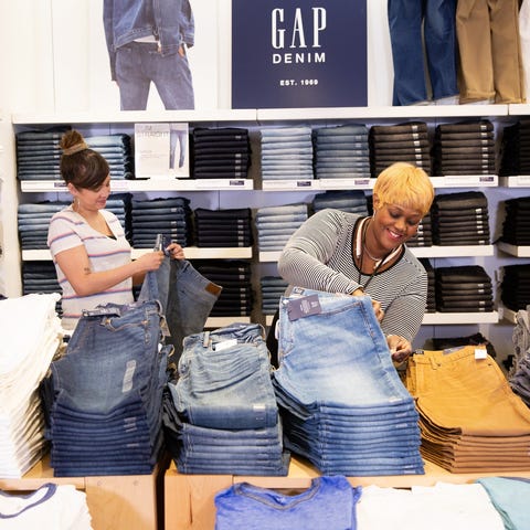 Gap sales associate in store.