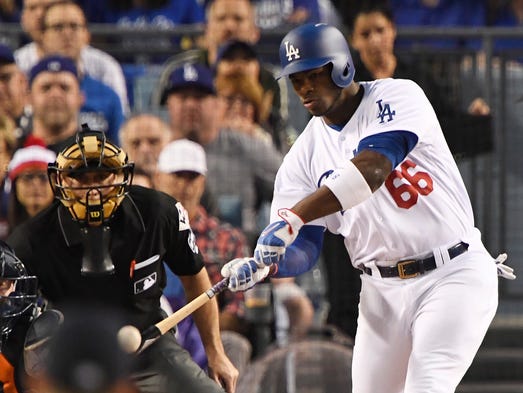 Game 6 at Dodger Stadium: Yasiel Puig hits a single