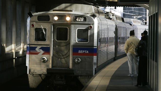 FILE - A SEPTA regional train, the R7, rolls into 30th Street station in Philadelphia in this Nov. 16, 2004 file photo. The transit agency serving Philadelphia and its suburbs is warning regional rail riders on the 2016 July 4 weekend of possible major disruptions in the days and weeks ahead after the company had to take about one-third of regional rail cars out of service due to a structural problem. SEPTA General Manager Jeffrey Kneuppel says there will be no problems on weekends and holidays â but "Tuesday ... will be rough on our railroad customers." (AP Photo/Jacqueline Larma, File)
