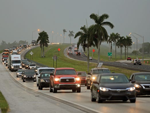 Traffic is seen heading North along the Florida Turnpike