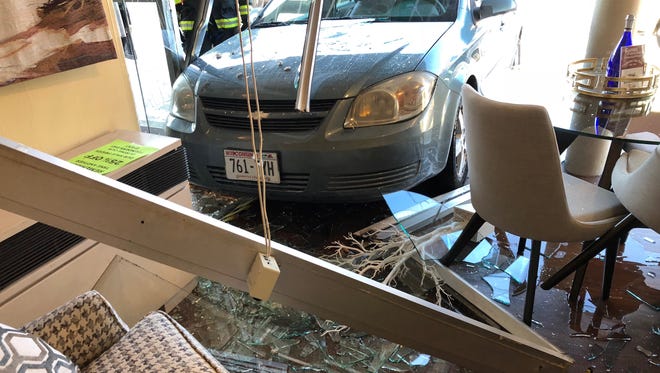 Gabriel Furniture had an unexpected encounter with a car on April 5.