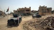 Humvees of the Iraqi Counter-Terrorism Service patrol