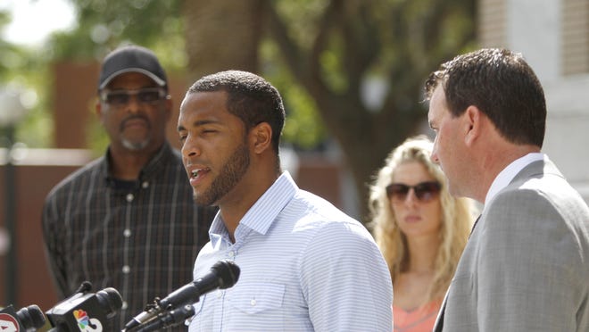 Nate Allen, who is suing the Fort Myers Police Department for being wrongfully arrested, speaks to the media Friday, July 24.