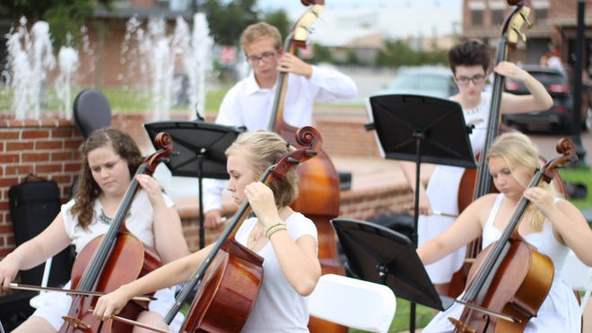 Chamber music sets the upscale tone for a past Evening in White fundraiser. This year's event gets underway Saturday.