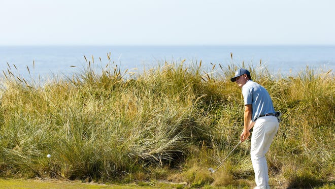 Charles Osborne plays his second shot at the sixth hole during the semifinals Saturday at the U.S. Amateur at Bandon Dunes Golf Resort.