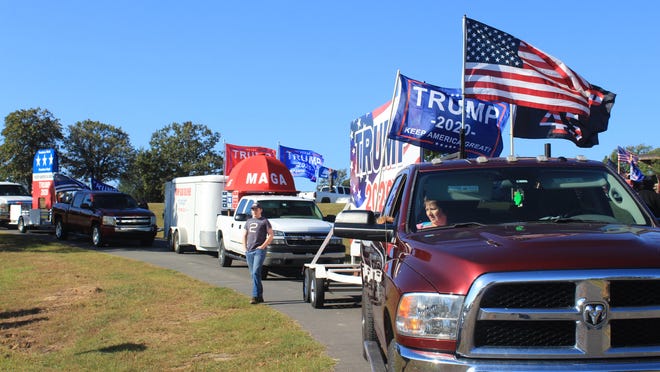 Motorists wait to commence a parade in support of President Donald Trump on Saturday, Oct. 18, 2020, at Bell Park in Greenwood.