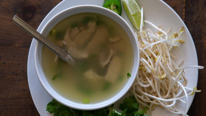 The lunch pho at Saigon is served with cilantro, bean sprouts, a slice of lime and jalapeno for $6.49 before tax. Choices of beef or tofu are available.