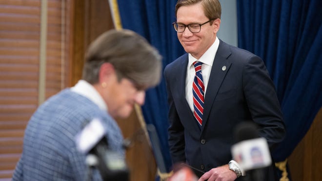 Kansas Secretary of Commerce David Toland smiles before making prepared remarks accepting the nomination for lieutenant governor by Gov. Laura Kelly in a news conference Monday at the Statehouse.