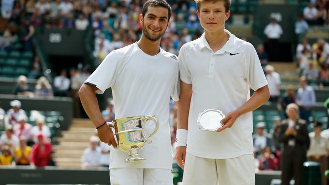  There is some promising news for the U.S.: Wimbledon juniors champion Noah Rubin, left, and runner-up Stefan Kozlov are both Americans.
