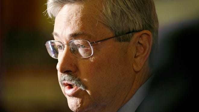 
Iowa Gov. Terry Branstad speaks to reporters outside his formal office, Wednesday, April 9, 2014, at the Statehouse in Des Moines, Iowa. Branstad, who fired Iowa Department of Administrative Services director Mike Carroll on Tuesday, says he's confident his interim director will protect records and will thoroughly review the staff to ensure the agency functions properly.
