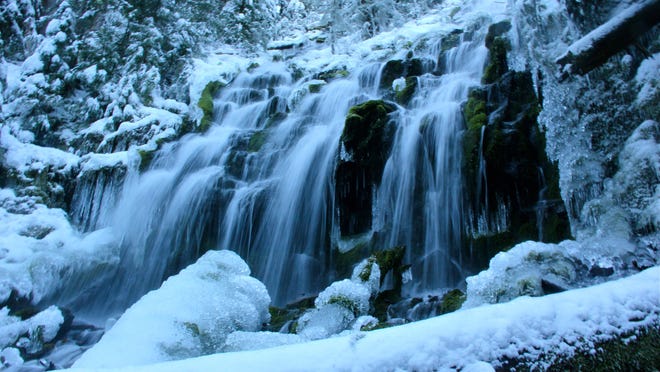 Upper Proxy Falls, located near McKenzie Pass east of Eugene, can be visited during winter with a long snowshoe or ski trip.