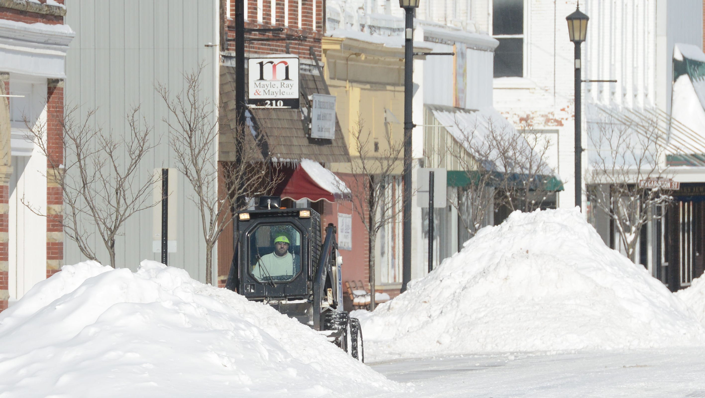 City officials to explore alternatives to rock salt on new sidewalks