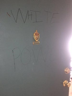 Kirsten Grant's apartment door in Des Moines was vandalized with the words "white power" on Nov. 13, 2016.