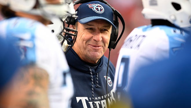 Titans head coach Mike Mularkey smiles on the sidelines during the first half at Arrowhead Stadium Saturday, Jan. 6, 2018 in Kansas City , Mo.