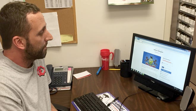 Brandon Gass of Lebanon, checks the status of his petition on Change.org that calls for Pennsylvania Gov. Tom Wolf to reject an influx of Syrian refugees into the state. As of Wednesday afternoon, the petition had garnered more than 63,000 signatures in 48 hours.