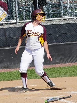 Kelsey Warman of Ross looks back with "celebration anticipation" for the Rams as she awaits the remaining runs to cross home plate after a seventh inning grand slam.
