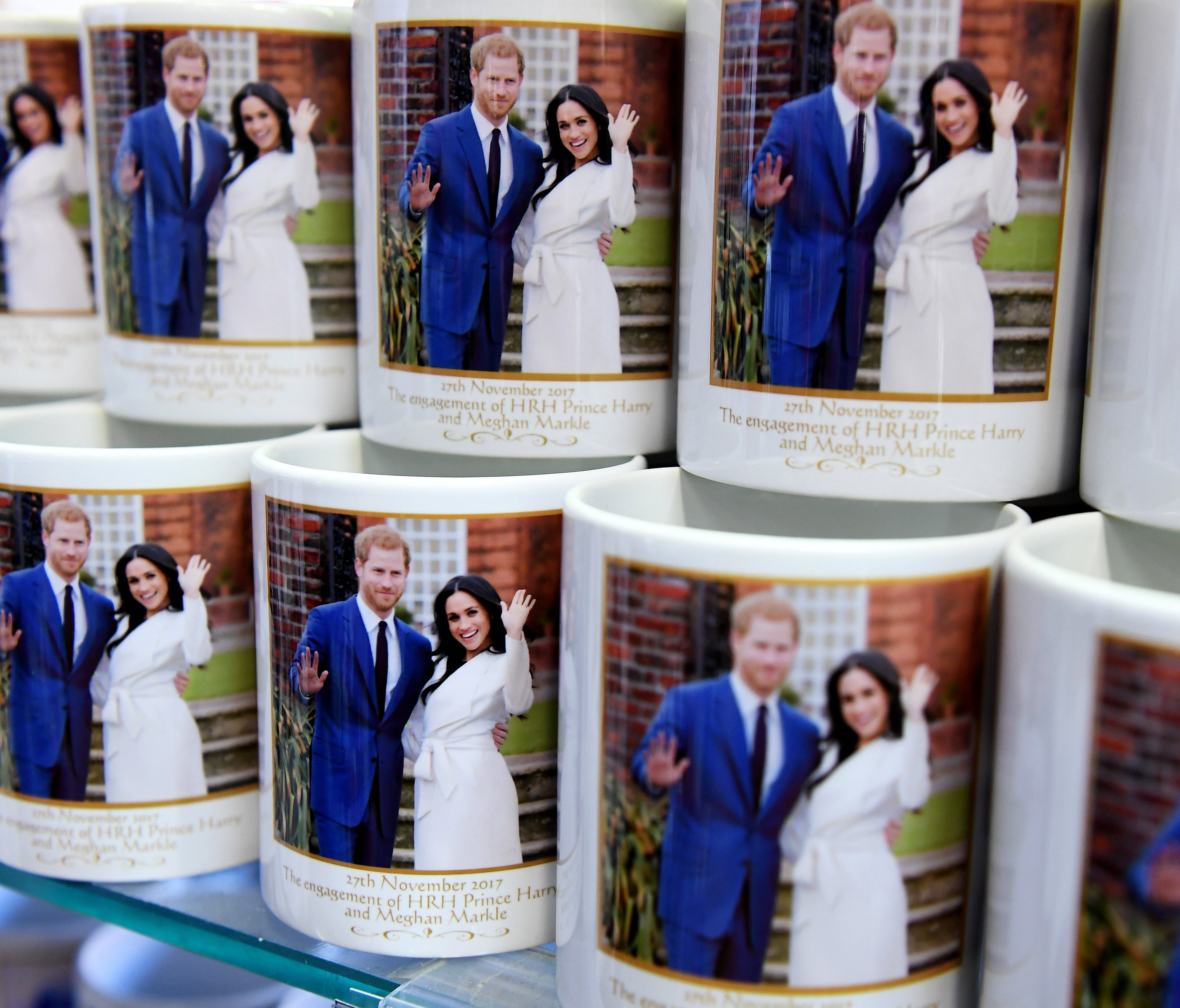 Mugs marking the wedding of Prince Harry and his fiancee Meghan Markle are on display at a souvenir shop in London.