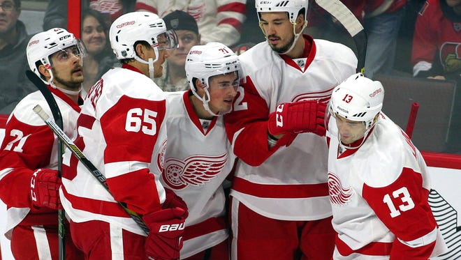Red Wings center Dylan Larkin (71) celebrates his goal during the first period Monday in Ottawa.