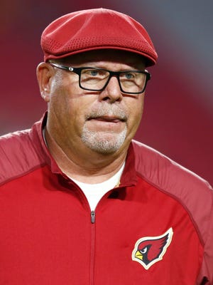 Cardinals head coach Bruce Arians will wear his signature driving cap against the Minnesota Vikings on Dec. 10, 2015 in Glendale.