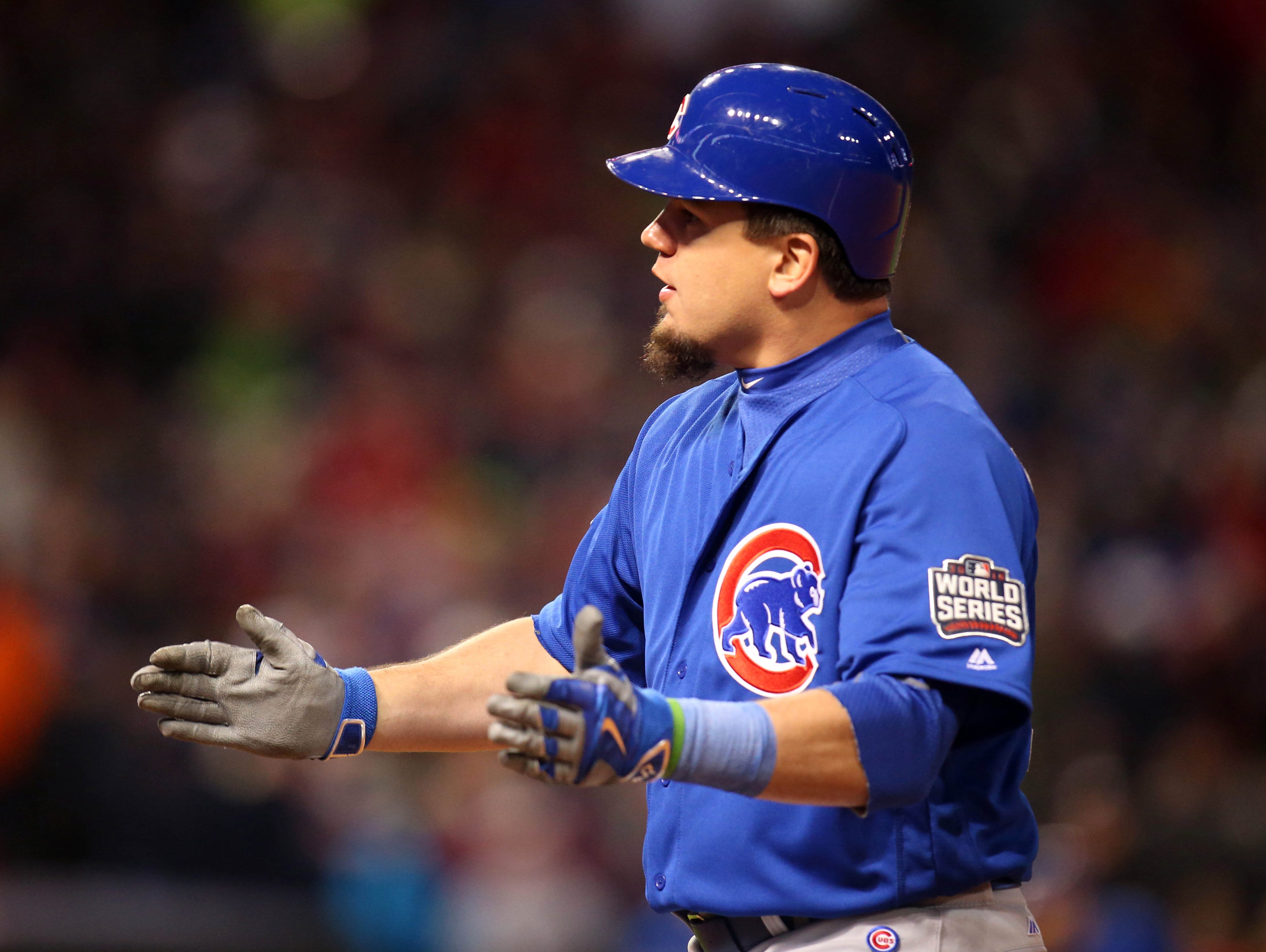 Chicago Cubs player Kyle Schwarber (12) reacts after hitting a RBI single against the Cleveland Indians in the third inning in game two of the 2016 World Series at Progressive Field.