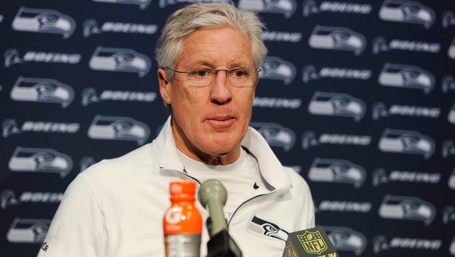 Seattle Seahawks head coach Pete Carroll speaks to the media during a news conference after the second half of an NFL divisional playoff football game against the Carolina Panthers, Sunday, Jan. 17, 2016, in Charlotte, N.C. The Panthers won 31-24.