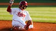 Luke Miller of the Indiana Hoosiers slides into third