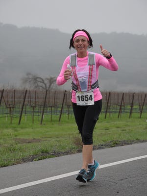 Lincroft’s Lisa Miele, shown here running the Napa Valley Marathon, is running Monday’s Boston Marathon for a good cause.