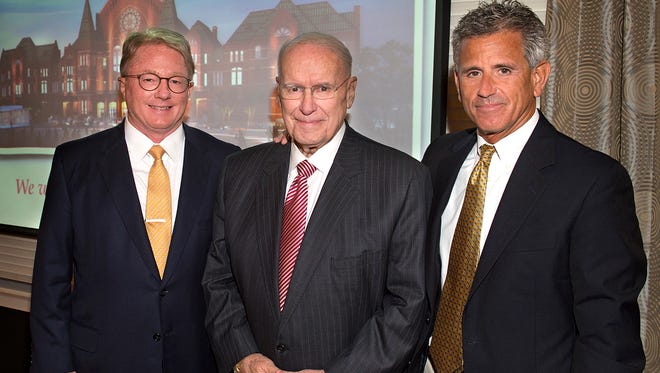 Peter Koenig, president of the Society for the Preservation of Music Hall, Otto M. Budig, Jr., who heads MHRC, and Stephen Leeper, president and CEO of 3CDC, project manager