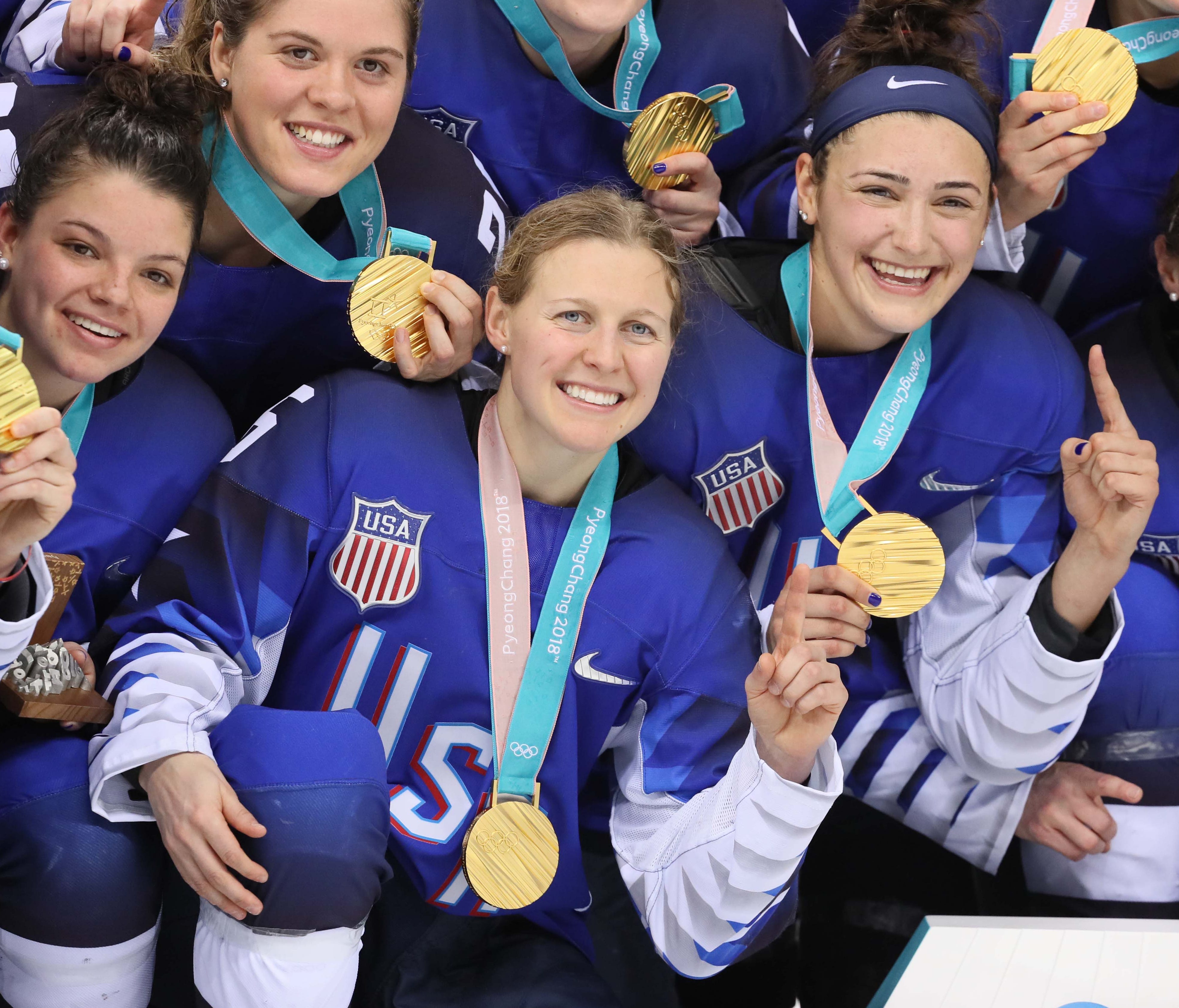 United States players celebrate their Olympic gold medal.