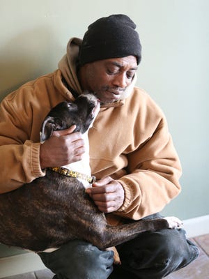 Bernard Holland and his dog, Oreo, enjoy some quality time at Wigglebutt Doghouse. “My plan is to get a job, get a place, reunite with Oreo and live out the rest of our lives together,” Holland said.