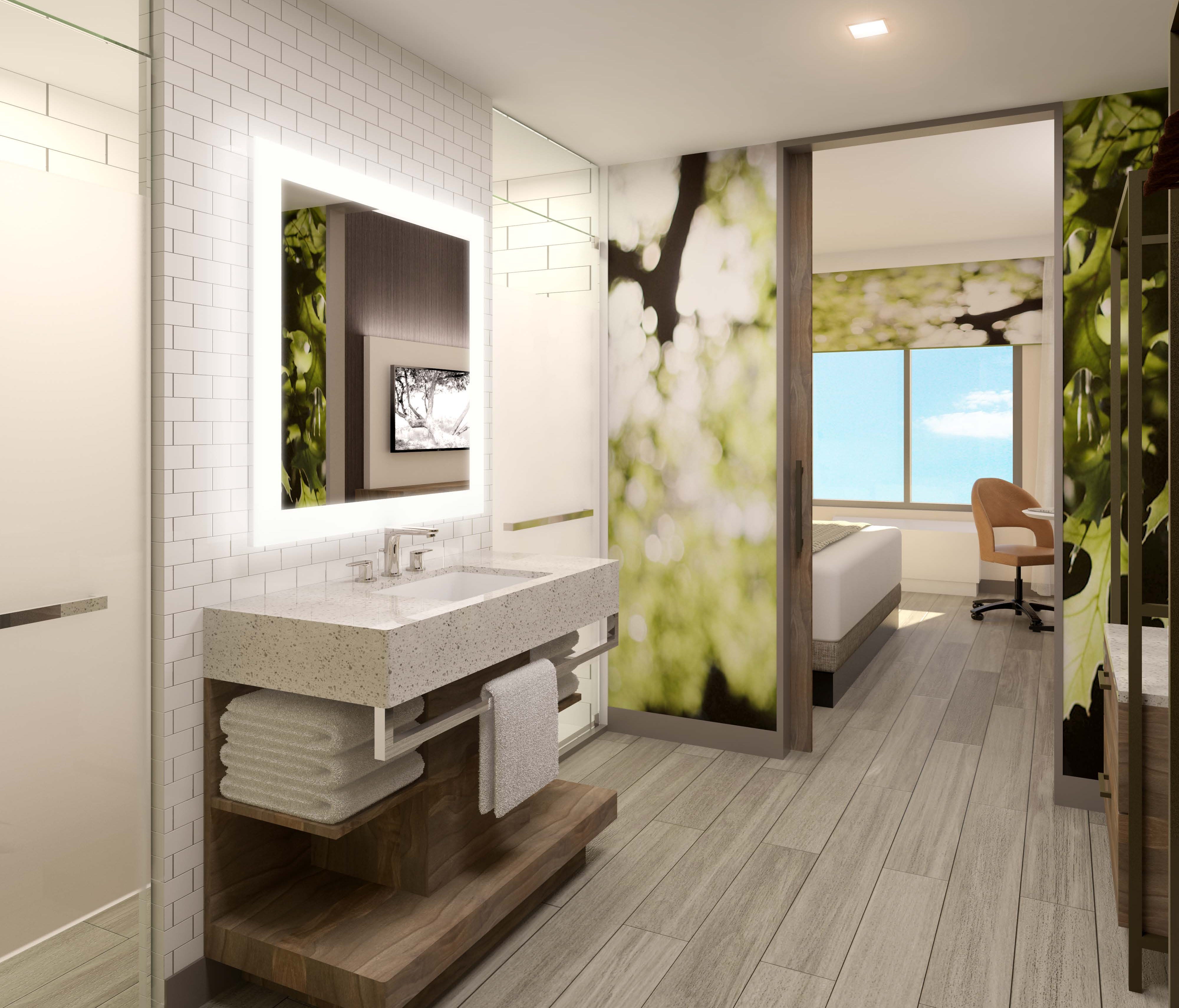 Hotels are getting more creative with guestroom bathrooms, including Wyndham Hotel Group, which has open layouts.