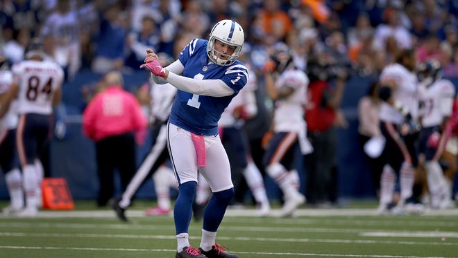 Indianapolis Colts punter Pat McAfee (1) get out his golf swing after punting his career bet 74-yard punt in the second half of their game. The Indianapolis Colts host the Chicago Bears in their NFL football game Sunday, October 9, 2016, afternoon at Lucas Oil Stadium.