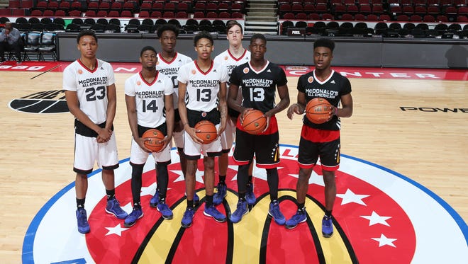 Apr 1, 2015; Chicago, IL, USA; McDonalds High School All Americans forward forward Ivan Rabb (23), center Caleb Swanigan (50), guard Malik Newman (14), forward Brandon X. Ingram (13) white jersey, forward Cheick Diallo (13) black jersey, forward Jaylen Brown (1) and center Stephen Zimmerman Jr. (33)  pose for a group photo  before the start of the McDonalds High School All American Games at the United Center. Mandatory Credit: Brian Spurlock-USA TODAY Sports