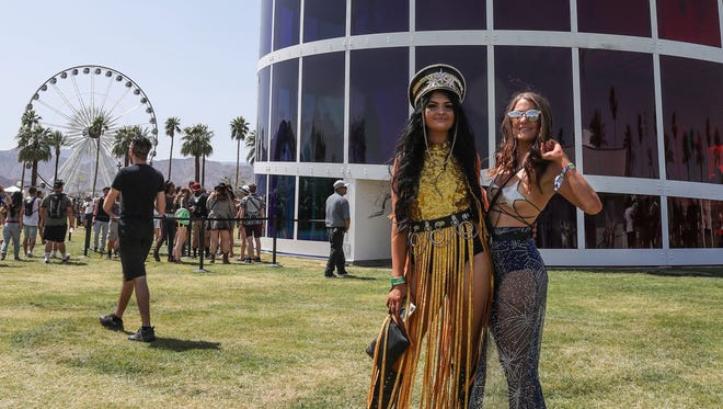 Apr 13, 2018; Indio, CA, USA; Music fans pose for a photo during the Coachella Valley Music and Arts Festival at Empire Polo Club. Mandatory Credit: Jay Calderon/The Desert Sun via USA TODAY NETWORK