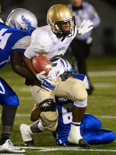 York Catholic’s Jakkar Kinard runs through the Steelton-Highspire