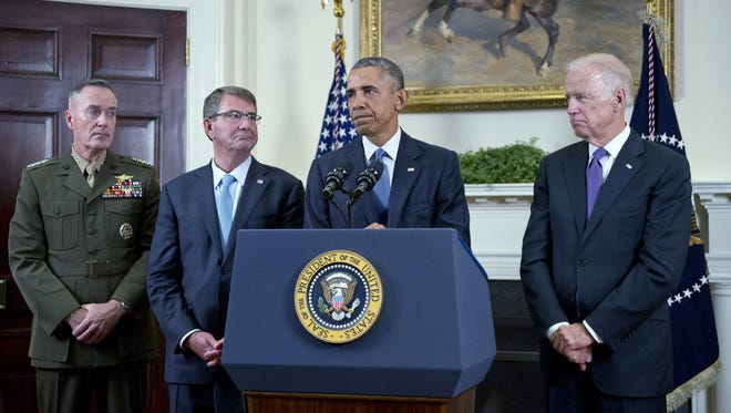 President Obama speaks at the White House as, from left, Joint Chiefs of Staff Chairman and  Marine Gen. Joseph Dunford,  Defense Secretary Ashton Carter and Vice President Biden discuss U.S. troop deployment in Afghanistan on Oct. 15, 2015, in Washington.